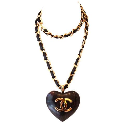 chanel black heart pendant|Chanel long necklace.